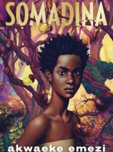 The cover of Somadina by Akwaeke Emezi features a striking portrait of a dark-skinned young figure with intense, soulful eyes, set against a vibrant, dreamlike forest. Twisting, magical trees and glowing orbs surround the character, evoking themes of mysticism and spiritual power. The title “SOMADINA” appears in bold, golden letters at the top, while the author’s name and “Sunday Times Bestseller” line sit prominently at the bottom. The artwork radiates strength, identity, and otherworldly energy—perfectly reflecting the novel's core essence.